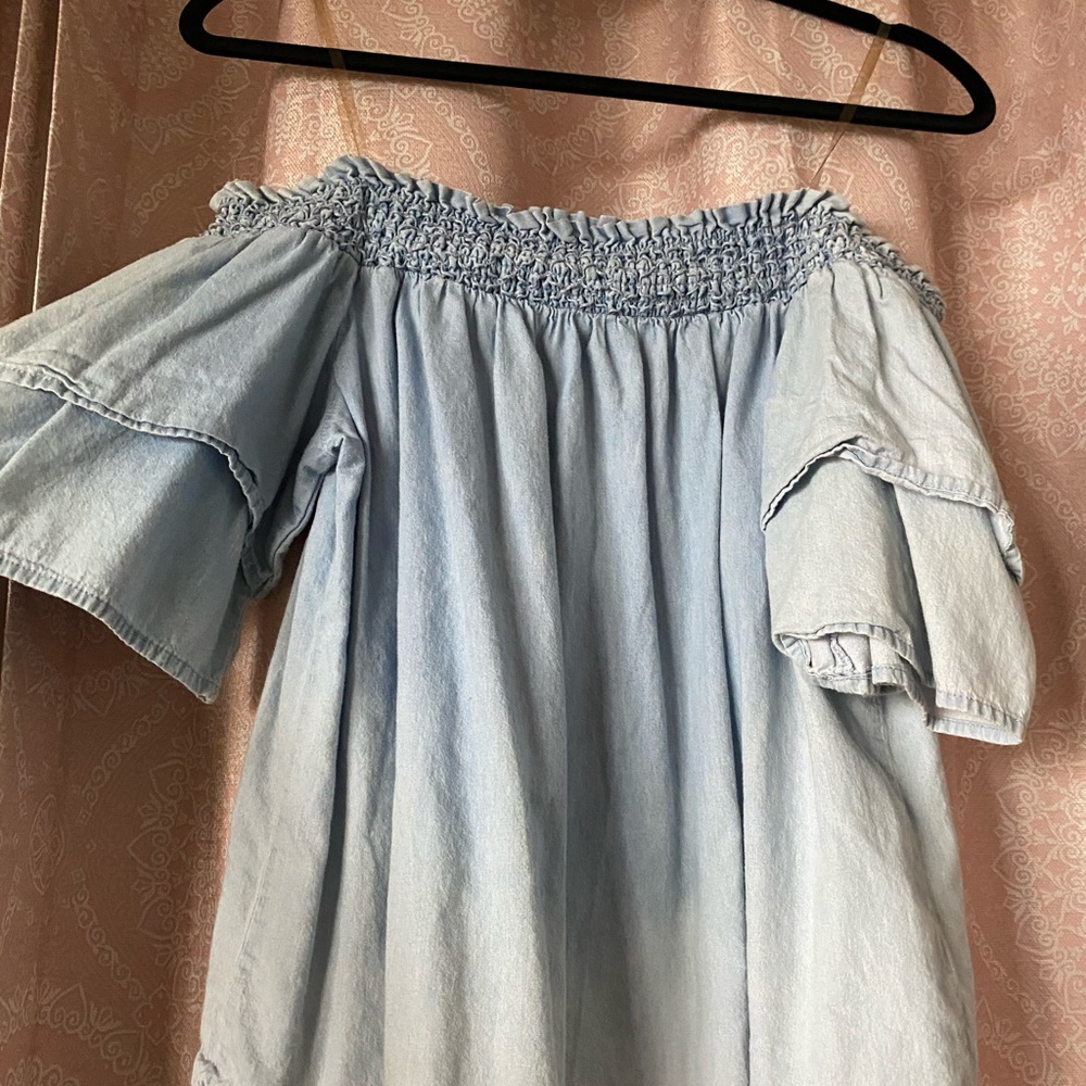 A ruffled off the shoulder blouse